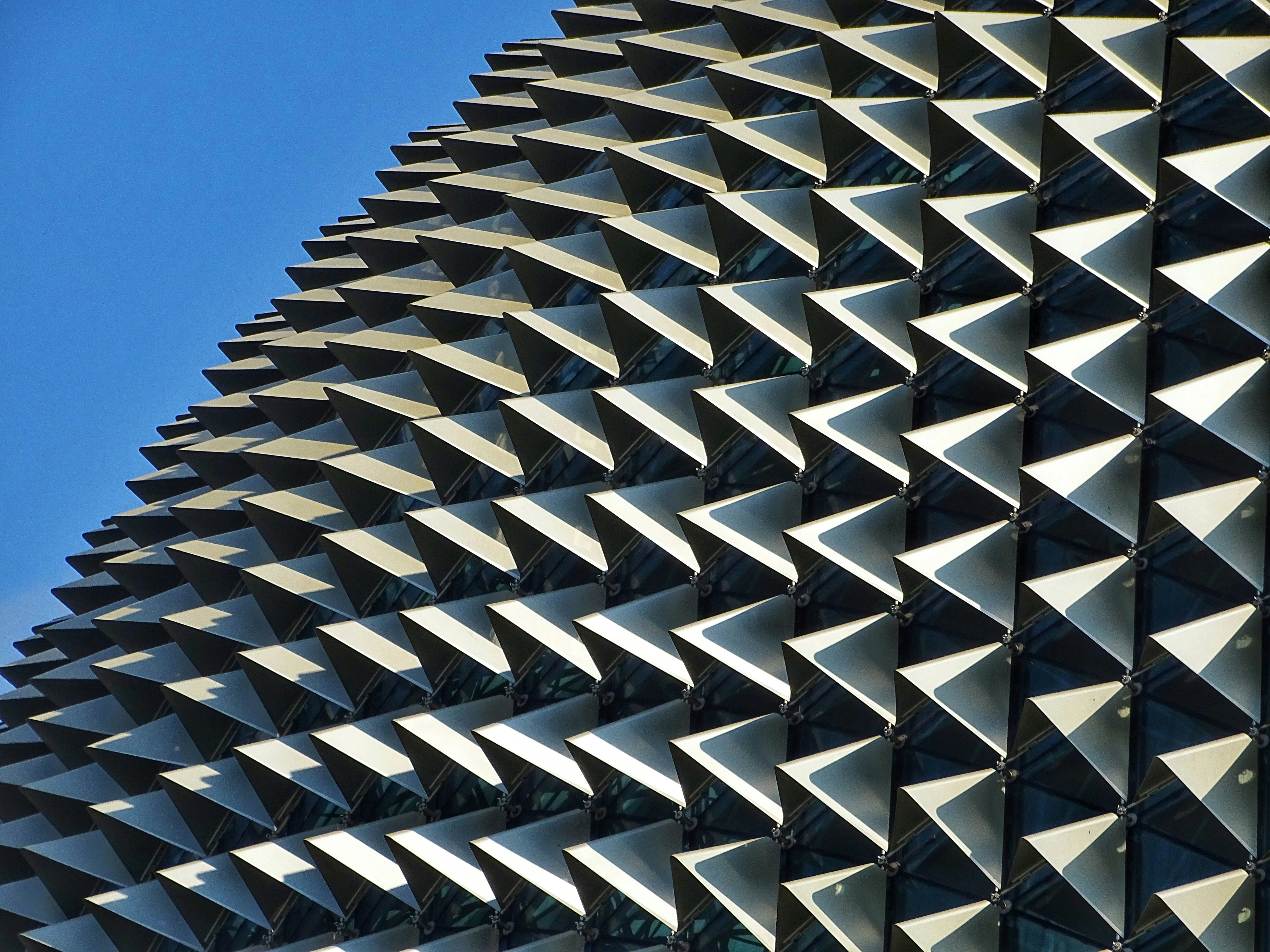 Walking around Marina Bay Singapore I thought this imaginative rooftop, looked like an Armadillo. Contrasting against the blue sky, the roof looks incredible.